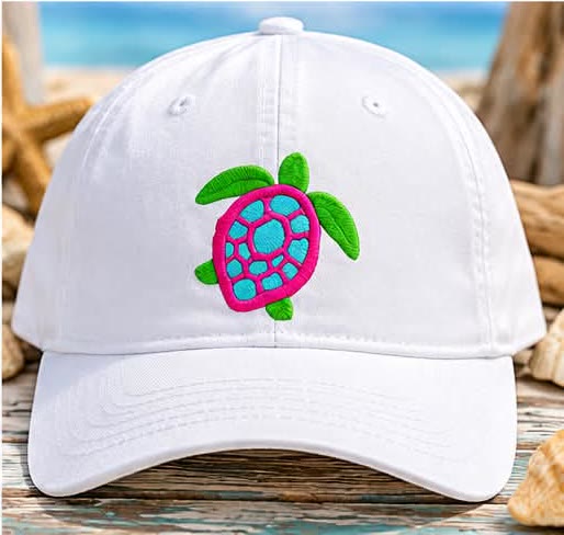 White ball cap embroidered with a pink and green sea turtle