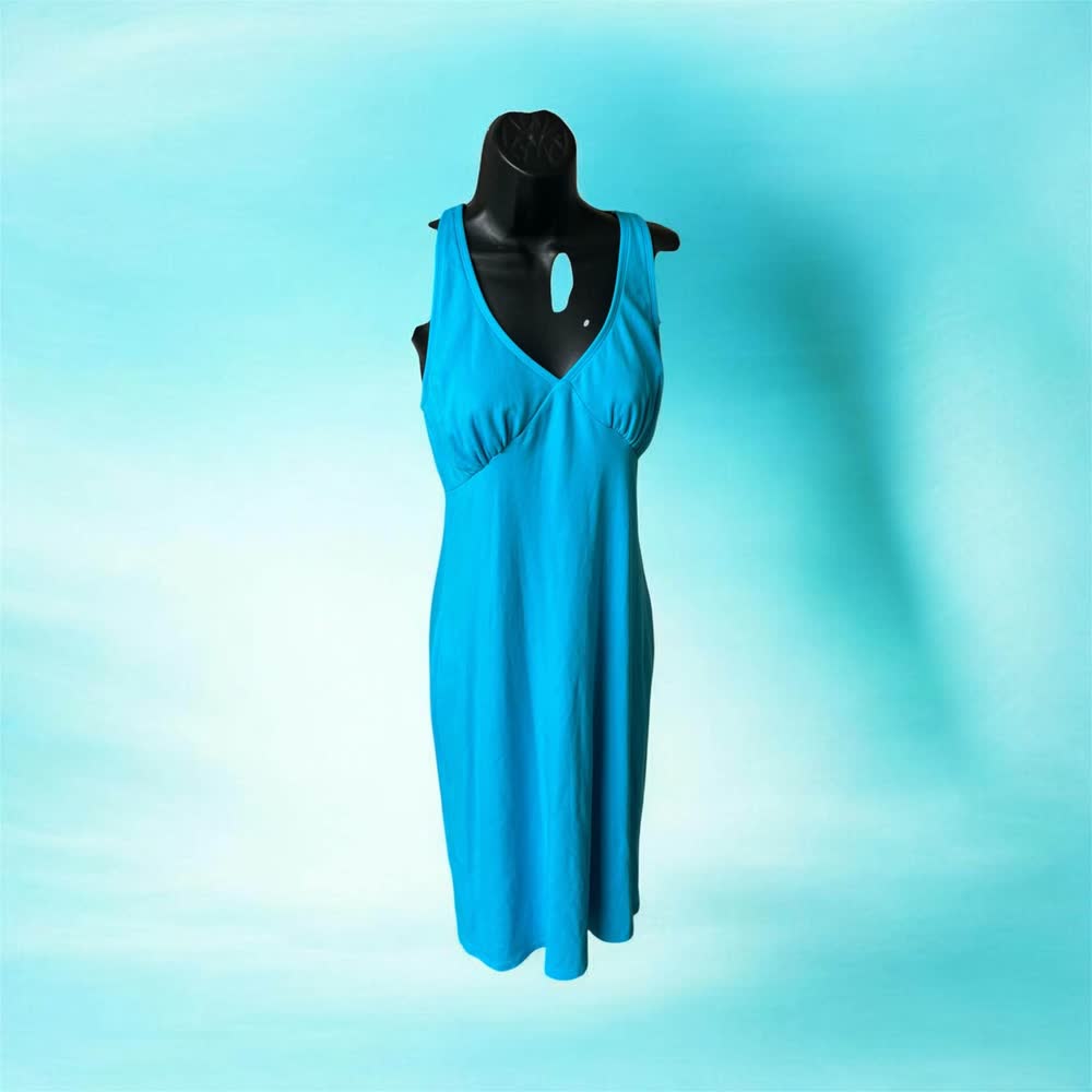 Bright turquoise sleeveless sundress with a keyhole neckline