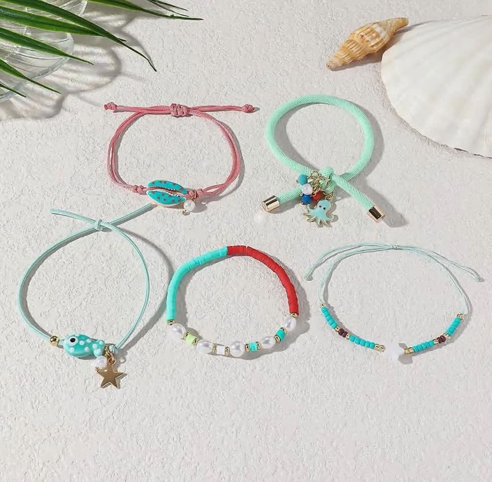Pastel adjustable cord bracelets with cowrie shell, fish and starfish charms