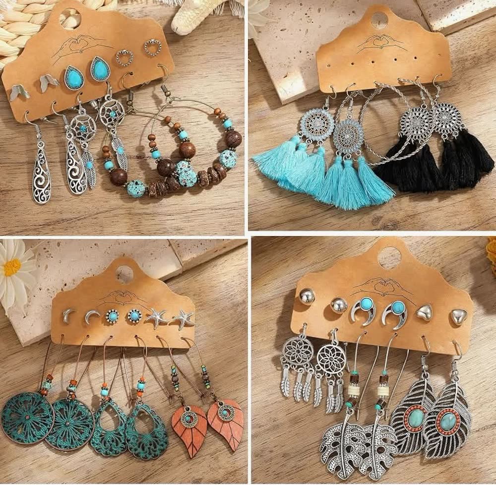 Cards of boho earring sets with turquoise stones, tassels, dreamcatchers and feathers