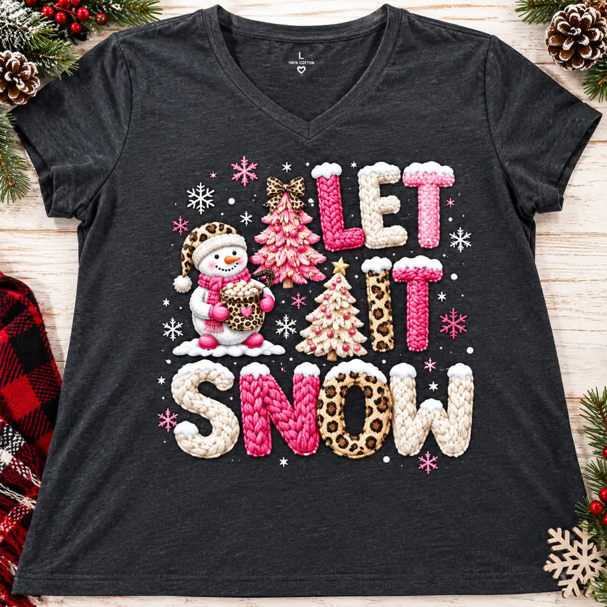 Charcoal v-neck tee with pink and leopard Let It Snow lettering, a snowman and pink Christmas trees